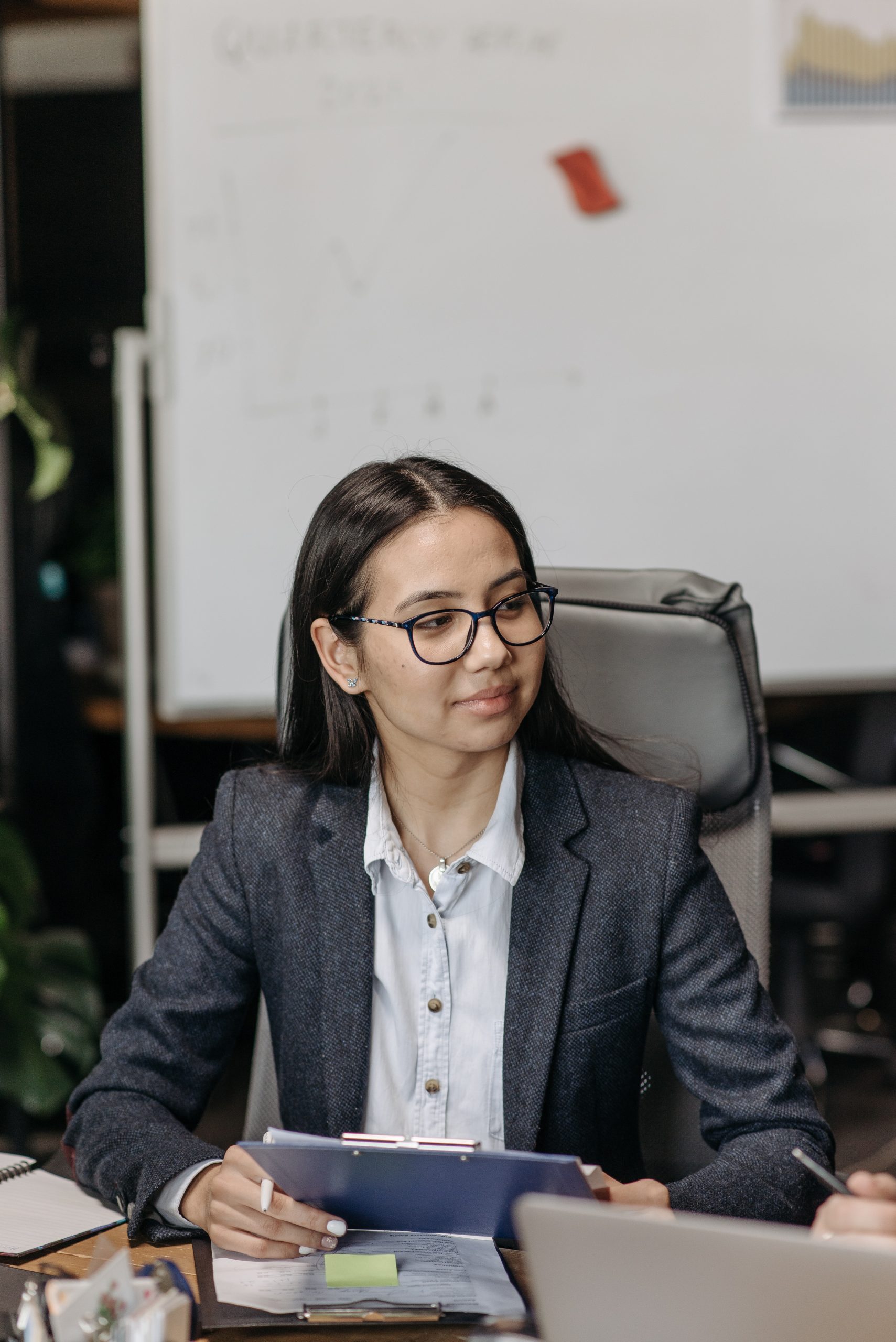 a lady is monitoring performance and giving constructive feedback